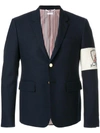 THOM BROWNE HIGH ARMHOLE SINGLE BREASTED SPORT COAT WITH EMBROIDERY PATCH ARMBAND IN NAVY CANVAS SUITING,MJC180E0206012372648