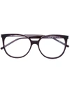 Saint Laurent Round Frame Glasses In Brown