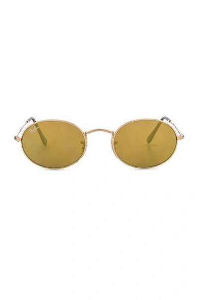 Ray Ban Oval Flat Sunglasses In Gold Flash