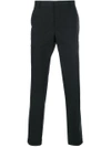 Prada Techno Stretch Slim Fit Trousers In Black