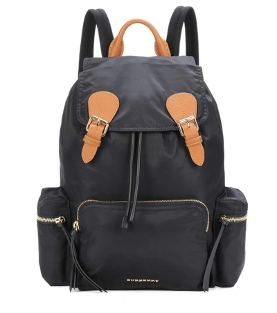 Burberry The Large Leather-trimmed Backpack In Black