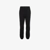 Msgm Embroidered Cotton-blend Fleece Track Pants In Black