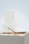 MAISON MARGIELA PATENT LEATHER ANKLE BOOTS,S58WU0171/SY0447/101