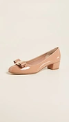 Ferragamo Vara Bow Patent Pumps In New Blush
