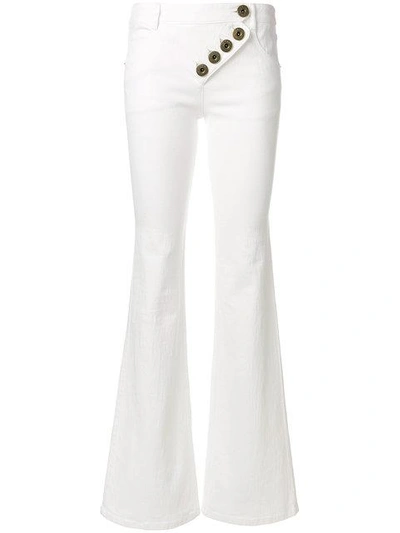 Chloé Mid-rise Asymmetric-button Flared Jeans In White