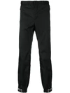 PRADA RUBBER TAG TRACK PANTS,UP0008S181I1812488162