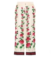 GUCCI Floral-printed silk trousers,P00299016