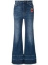 DOLCE & GABBANA FLARED JEANS WITH SACRED HEART APPLIQUÉ,FTAWMZG8T2412686658