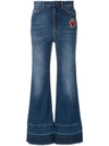 DOLCE & GABBANA flared jeans with sacred heart appliqué,FTAWMZG8T2412686658