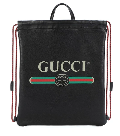 Gucci Printed Leather Drawstring Backpack In Black