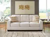 Ashley Storrow Sofa In Gray
