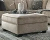 Ashley Bovarian Ottoman In Gray
