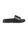 Gucci Gg Embossed Leather Slide Sandals In Black