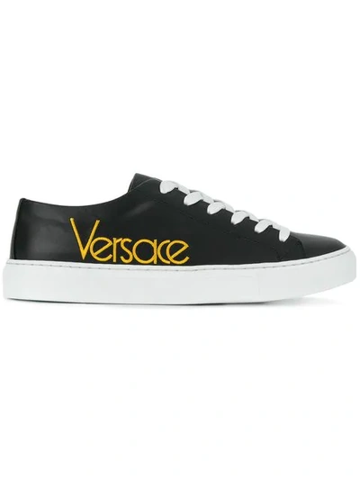 Versace Embroidered Logo Sneakers In Black