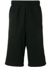 MCQ BY ALEXANDER MCQUEEN MCQ ALEXANDER MCQUEEN SIDE ZIPPED TRACK SHORTS - BLACK,486306RKR2312702551