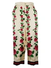 GUCCI FLORAL PRINT TROUSERS,10513054