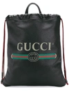 Gucci Printed Leather Drawstring Backpack In Black