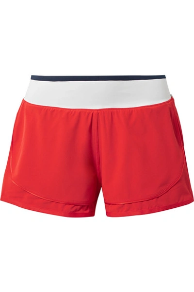 Adidas By Stella Mccartney Climastorm Hiit Striped Layered Stretch Shorts In Rust