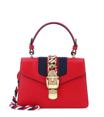 Gucci Sylvie Mini Chain-embellished Leather And Canvas Shoulder Bag In Red