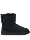 Ugg Mini Bailey Bow Ii Shearling Fur Boots In Black