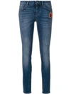 DOLCE & GABBANA skinny jeans with Sacred Heart patch,FTAQWZG8X7912773681