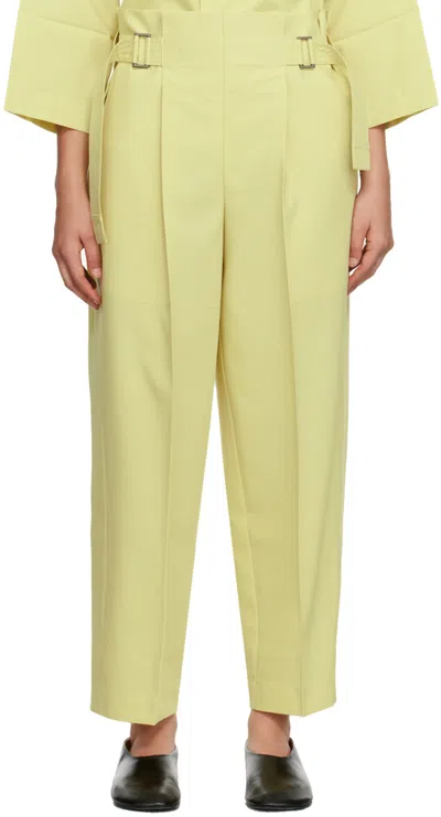 132 5. Issey Miyake Yellow Flat Tuck Trousers In 51 Cream Yellow