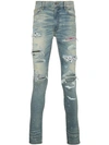 AMIRI art patch printed skinny jeans,MBAPJS1812496910
