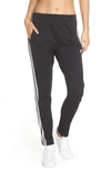 Adidas Originals Sst Striped Jersey Track Pants In Black