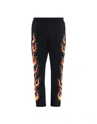 Moschino Flames Printed Studded Track Pants In Black