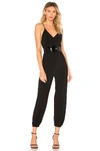 Norma Kamali Fara Crossover-strap Jersey Jumpsuit In Black