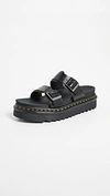 Dr. Martens' Myles Brando Leather Buckle Slide Sandals In Black