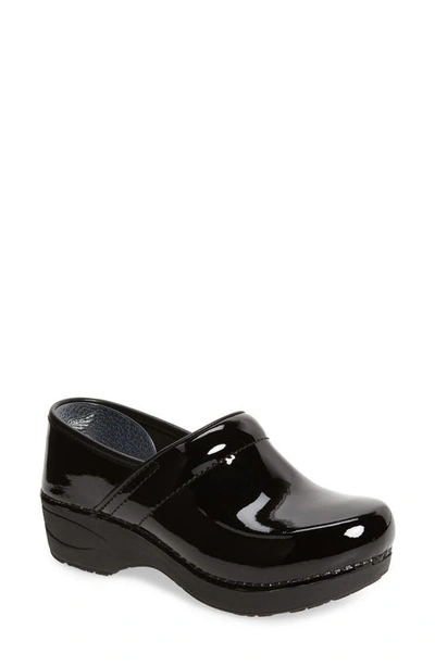 Dansko Professional Womens Solid Patent Leather Clogs In Black