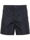 Moncler Logo Stripe Embroidered Swim Shorts In Blue