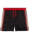 GUCCI ACETATE SHORTS WITH GUCCI STRIPE,522951Z738C12964774