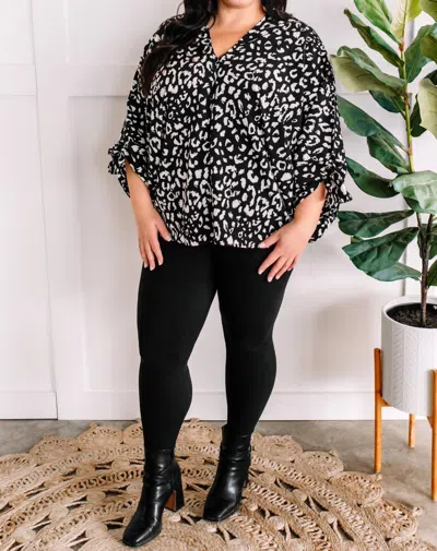 143 Story Dolman Sleeve Blouse With Bow Sleeve In Black & White Animal Print