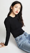 L Agence Tess Long Sleeve Stretch Jersey Top In Black