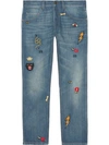 GUCCI TAPERED DENIM PANT WITH SYMBOLS,408637XD83612964707