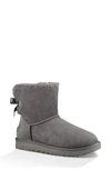 UGG MINI BAILEY BOW II GENUINE SHEARLING BOOTIE,1016501