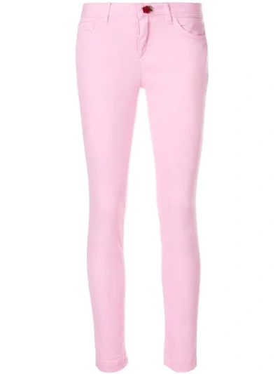 Dolce & Gabbana 玫瑰纽扣紧身牛仔裤 - 粉色 In Pink