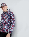 NORTH SAILS STASH PACKABLE WINDBREAKER IN ALL OVER LOGO PRINT - NAVY,602399 C004