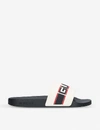 GUCCI LOGO-EMBOSSED RUBBER SLIDERS,95443164