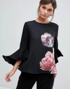 TED BAKER WATERFALL SLEEVE TOP IN TRANQUILITY FLORAL PRINT - BLACK,146891