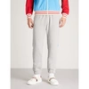 Gucci Tapered Logo-print Loopback Cotton-jersey Sweatpants In Gray