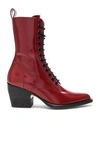 CHLOÉ CHLOE RYLEE SHINY LEATHER LACE UP BUCKLE BOOTS IN RED