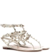 Valentino Rockstud Flat Leather Sandals In Gold