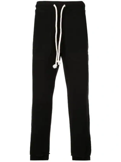 Maison Margiela Loose Fitted Track Trousers In Black