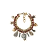 HALO & CO BURNT RED CRYSTAL BRACELET WITH VINTAGE CHARMS IN ANTIQUE GOLD TONE