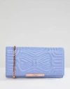 TED BAKER QUILTED BOW MATINEE PURSE IN LEATHER - BLUE,147062