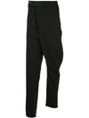 JULIUS wrap-front tapered trousers
