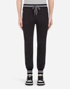 DOLCE & GABBANA COTTON JOGGING PANTS WITH BRANDED SIDE BANDS,GY9JATFU7DUS8293